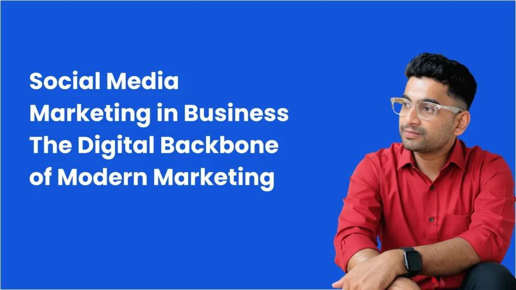 A man wearing glasses and a red shirt sitting against a blue background beside text that says Social Media Marketing in Business The Digital Backbone of Modern Marketing best freelance digital marketing expert in malappuram